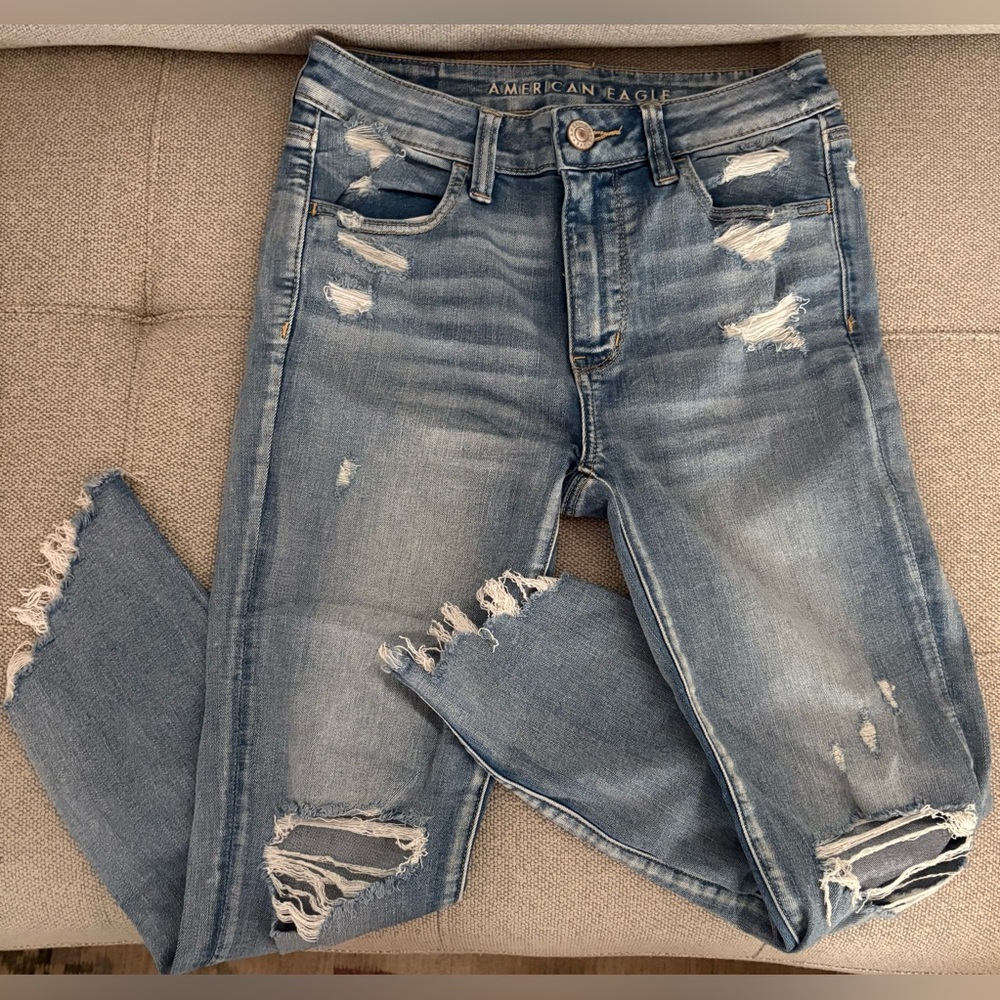 American Eagle - Stretch Light Wash Jeans with Rips and Fringed Ends - Size 2